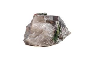 Macro mineral tourmaline stone in quartz on a white background photo