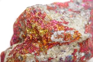 Macro mineral stone Chalcopyrite in the rock on a white background photo