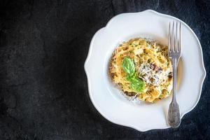 Served pasta carbonara photo