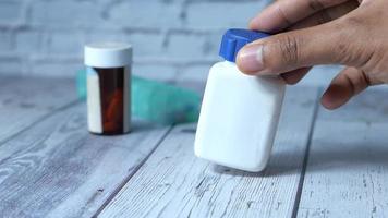 Close up of man hand holding pill container video