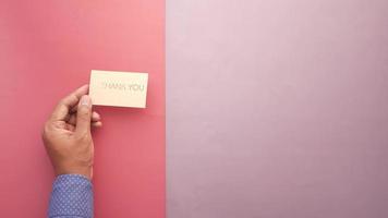 close up of man hand reading a thank you letter video