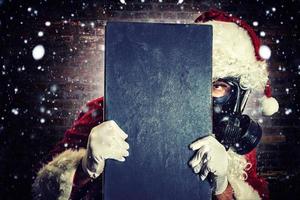 Santa with gas mask photo