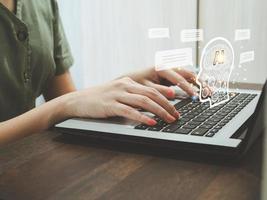 Young woman using. Chat with AI. Artificial intelligence operation using Chatbot. Help answering questions. Friend chat. Find future information. photo
