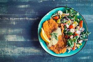 Fried catfish and salad photo