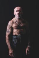 Bald and tattooed man photo