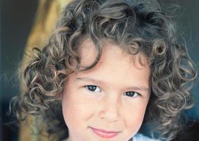 Portrait of girl with curly hair photo