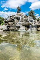 Stone watefall fountain photo