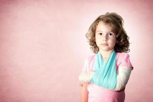 Little kid with broken hand photo