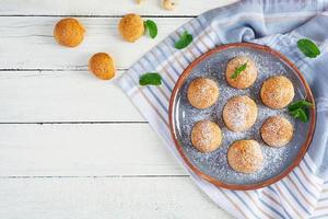 Butter cookies on wooden background. Delicious honey gingerbread photo