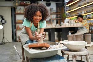 Small business owner of Young People Creating Pottery photo