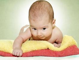 Baby and towels photo