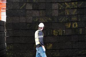 Architect, foreman working at construction or architecture site photo