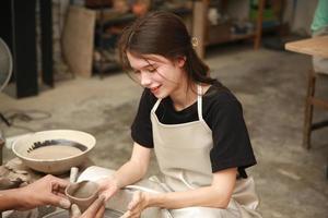 Small business owner of Young People Creating Pottery photo