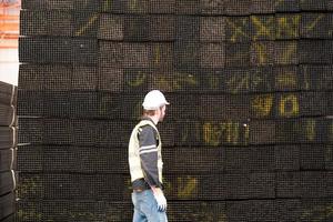 Architect, foreman working at construction or architecture site photo