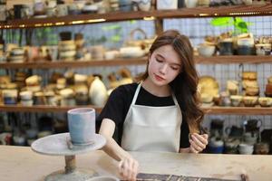 Small business owner of Young People Creating Pottery photo