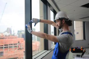 Architect, foreman working at construction or architecture site photo