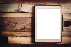 Tablet on apstract background photo