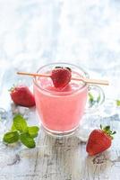 Strawberry smoothie in the glass photo