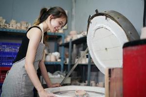 Small business owner of Young People Creating Pottery photo