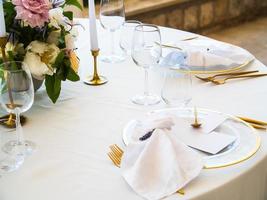 Luxury elegant wedding reception table arrangement and floral centerpiece - wedding banquet and event outdoor photo