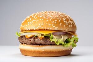 Delicious fresh burger with beef and pork cutlet, melted cheese and tomato on a white background, isolate. . photo