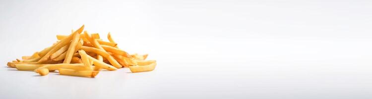 Fried hanging french fries with in a pile on a white background isolate. . Header banner mockup with space. photo