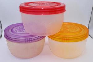 Store multipurpose food container,small food storage,snack containers,reuseable food plastic containers with lids on white background photo