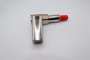 Waterproof liquid lipstick mate make up velvet red lip gloss cosmetics on white background photo