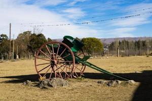 old wooden sulky in the argentinian countryside photo