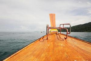 Wooden Head tradition longe tail boat Head to the Andaman sea in Thailand photo