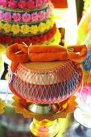 Yellow robe on Monk's alms bowl for Newly ordained Buddhist monk pray with priest procession. photo