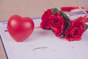 Reminder Wedding day in calendar planning and heart sign with color tone. photo