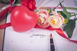 Reminder Wedding day in calendar planning and fountain pen with color tone. photo