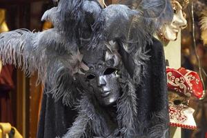 veneciano mascaras para rebaja en un mercado puesto foto