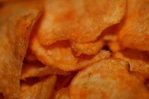 Top view of potato chips with paprika spice fast food concept eating junk food background high quality big size instant prints stock photography photo