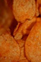 Top view of potato chips with paprika spice fast food concept eating junk food background high quality big size instant prints stock photography photo