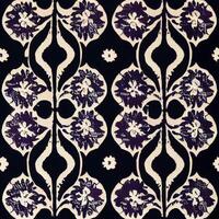 purple and white floral design on a black background. . photo