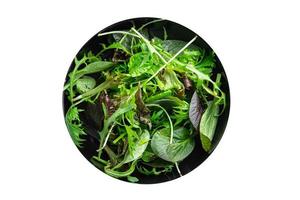 green salad leaves fresh mix healthy snack food on the table copy space food background rustic top view photo