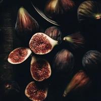 A Close-Up of Fresh Figs on a Wooden Board, Sweet Satisfaction, still life photography photo