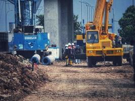 Jakarta, Indonesia in February 2023. Spunpile pile driving process with limited space. photo