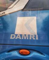Jakarta, Indonesia in March 2023. DAMRI logo on a public bus. photo