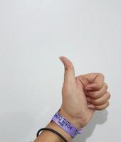 Jakarta, Indonesia on March 2023. Isolated photo of a hand with wristband blackpink concert