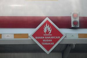 A warning sign for a fuel tank, namely a combustible fuel sign photo