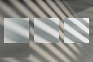 Mockup of a three square greeting cards with striped shadow overlay photo
