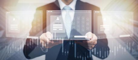 Businessman hand hold folder of document Management System,  online documentation database and process automation to efficiently manage files work, knowledge, Corporate business technology. photo