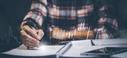 Businessman using pen write folder of document Management System,  online documentation database and process automation to efficiently manage files work, knowledge, Corporate business technology. photo