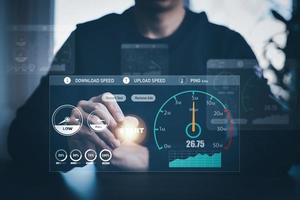 Fast internet connection with Metaverse technology concept, Hand holding smartphone and Virtual screen of Internet speed measurement,Internet and technology concept, 6G Hi speed internet concept photo