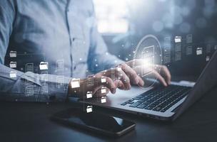 E-signing, electronic signature, document management concept, Man working on laptops with Online documentation database, searching and managing corporate files, documentation in enterprise with ERP. photo