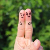 Finger art of Happy couple showing thumbs up photo