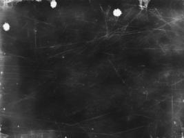 Vintage Black Scratched Grunge Background with Old Film Effect - Abstract Dark Texture for Design and Art - Retro Distressed Weathered Worn Eroded Decay Monochrome Backdrop photo